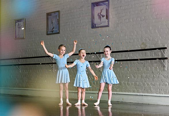 Young dancers celebrating in the studio